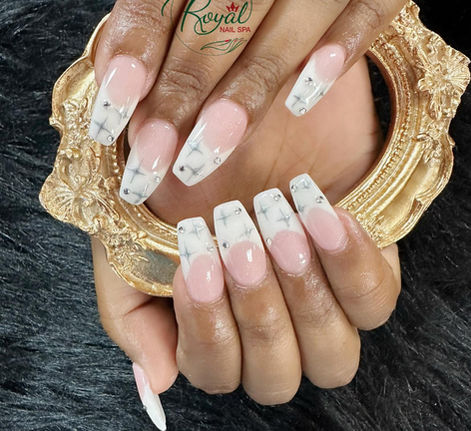Pink and white marble French-tip nails with silver details