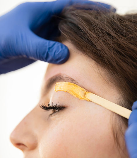 Professional eyebrow waxing treatment